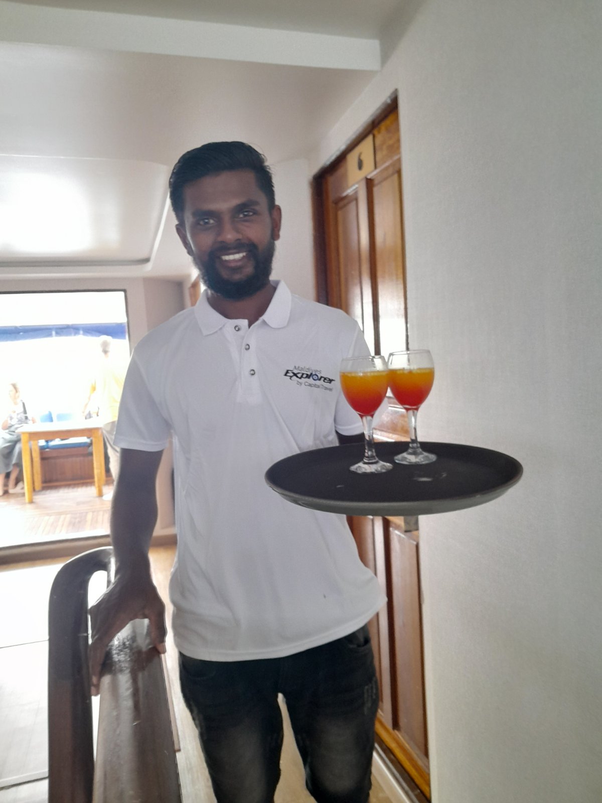 A welcome drink served on arrival aboard